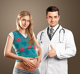 Image showing Pregnant Woman With Doctor