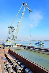 Image showing crane and steel plate in harbor