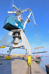 Image showing crane and steel plate in harbor