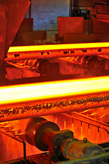 Image showing hot steel on conveyor 