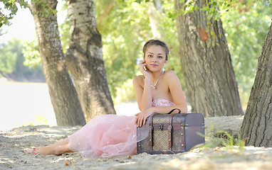 Image showing beauty girl  in a old-fashioned dress in a forest 