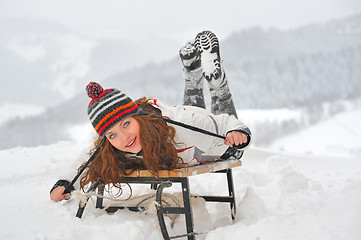 Image showing young  girl on sleigh