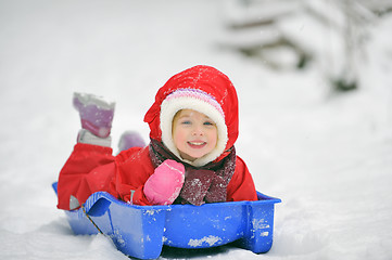 Image showing girl on sleigh