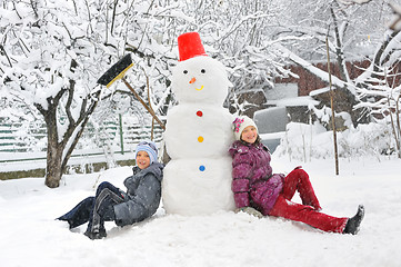 Image showing snowman and kids