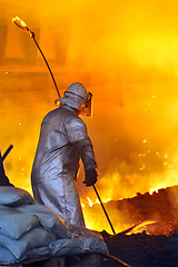 Image showing worker with hot steel 