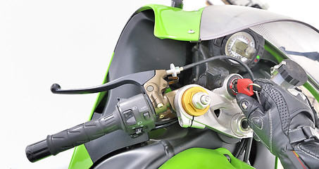 Image showing motorcycle gloves with carbon and bike