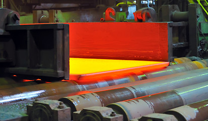 Image showing hot steel on conveyor 