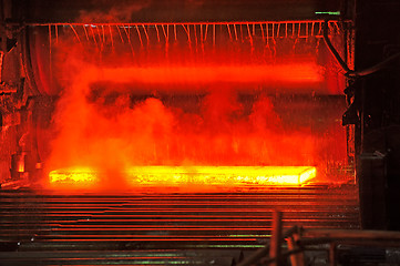 Image showing hot steel on conveyor