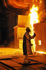 Image showing worker with hot steel 