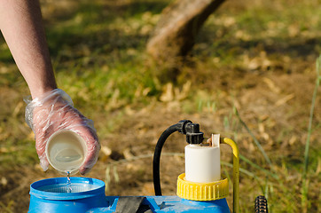 Image showing Filling in pesticide