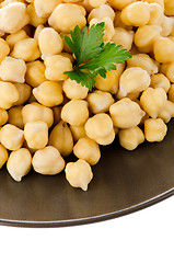 Image showing Chickpeas in a brown plate