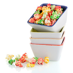 Image showing Pile of ceramic bowls of popcorn