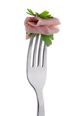 Image showing Slice of ham skewered on a fork 