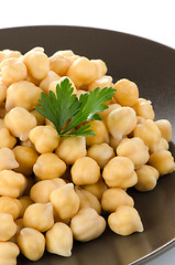 Image showing Chickpeas in a brown plate