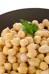 Image showing Chickpeas in a brown plate