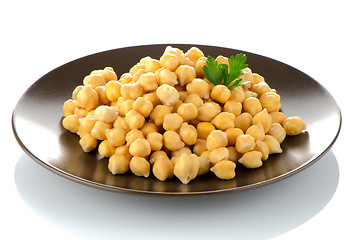 Image showing Chickpeas in a brown plate