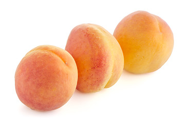 Image showing Three sweet peaches