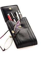 Image showing Leather pencil case and glasses