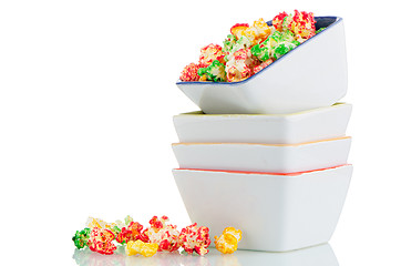 Image showing Pile of ceramic bowls of popcorn