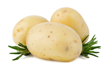 Image showing New potatoes and green herbs