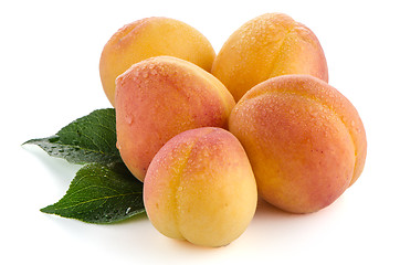 Image showing Sweet peaches with leafs