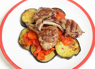 Image showing Lamb chops on salsa high angle