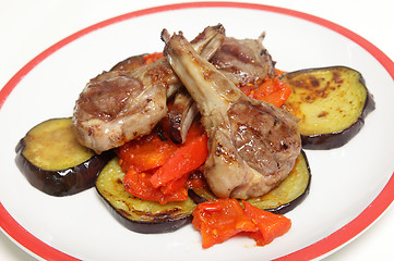 Image showing Grilled lamb chops on salsa
