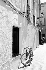 Image showing bicycle at a white wall