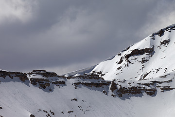 Image showing Top of mountains with snow cornice