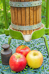 Image showing apples with old fruit press