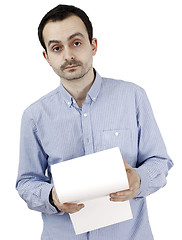 Image showing Man holding a paper