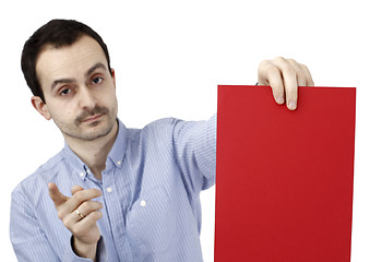 Image showing Man holding a paper