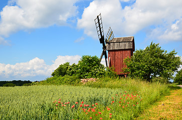 Image showing Old red windmill