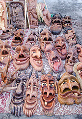 Image showing wooden carved funny masks market fair rural crafts 