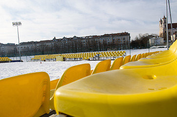 Image showing volleyball court yellow chairs winter center city 