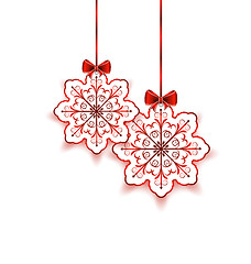 Image showing Christmas snowflakes with bow isolated on white background