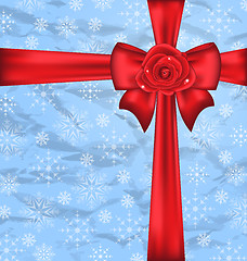 Image showing Festive packing with gift bow, snowflakes texture