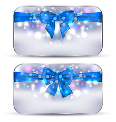 Image showing Christmas glowing cards with gift bows isolated