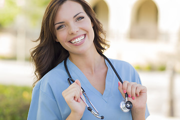 Image showing Young Adult Woman Doctor or Nurse Portrait Outside