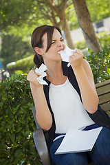 Image showing Upset Young Woman with Pencil and Crumpled Paper in Hands