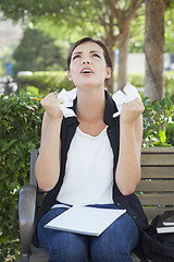 Image showing Upset Young Woman with Pencil and Crumpled Paper in Hands