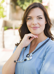 Image showing Young Adult Woman Doctor or Nurse Portrait Outside