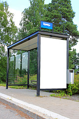 Image showing Urban Bus Stop Shelter with Blank Billboard