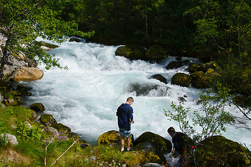 Image showing Filling water bottles