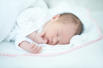Image showing Adorable Baby Girl is Sleeping on Bed