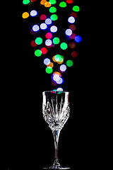 Image showing Light bubbles coming out of a wine glass