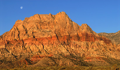 Image showing Moon over Red Rock Canyon, Nevada at sunrise