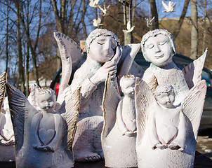 Image showing cute clay ceramic angel figures fair market bazaar 