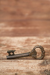 Image showing Retro key on wooden table