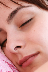 Image showing Beautiful young woman sleeping.